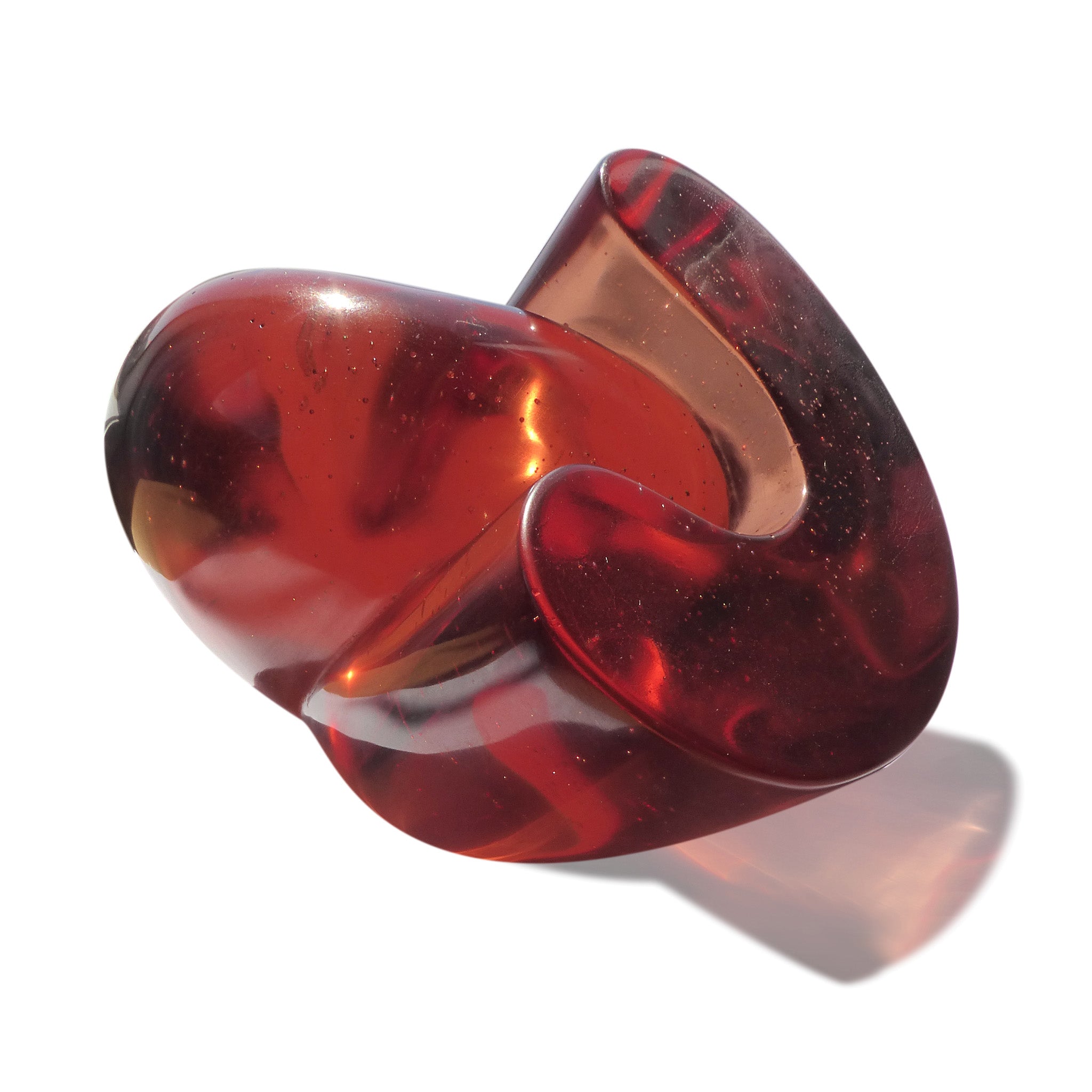 Abstract polished cast glass sculpture of red blood cells by Stephen Williams | New Zealand.