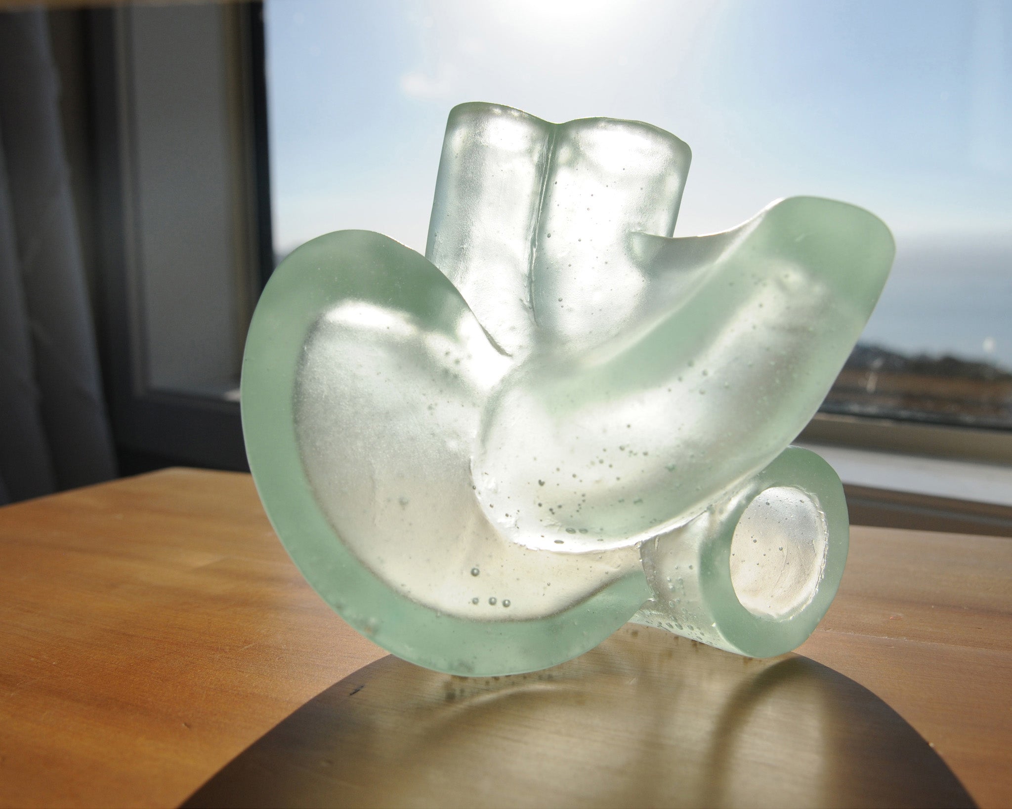 Abstract cast glass sculpture of the heart by Stephen Williams.