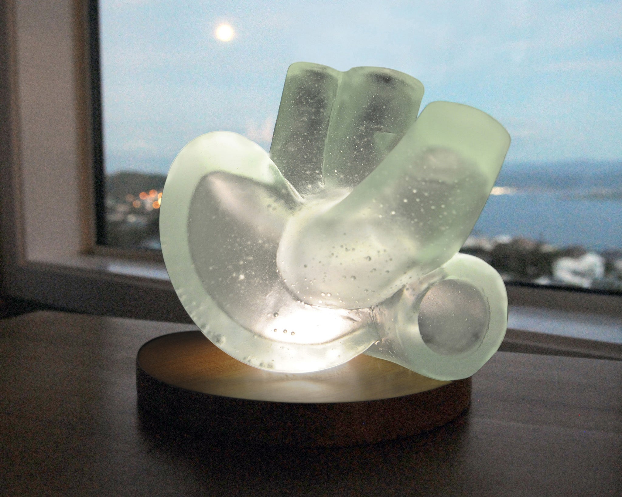 Abstract cast glass sculpture of the heart with light for sale by Stephen Williams.