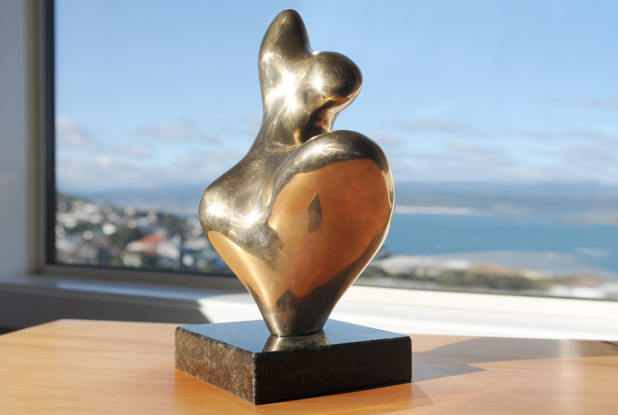 Abstract female figurative bronze sculpture by Stephen Williams