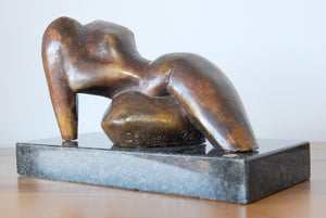 Reclining bronze abstract figure sculpture by Stephen Williams