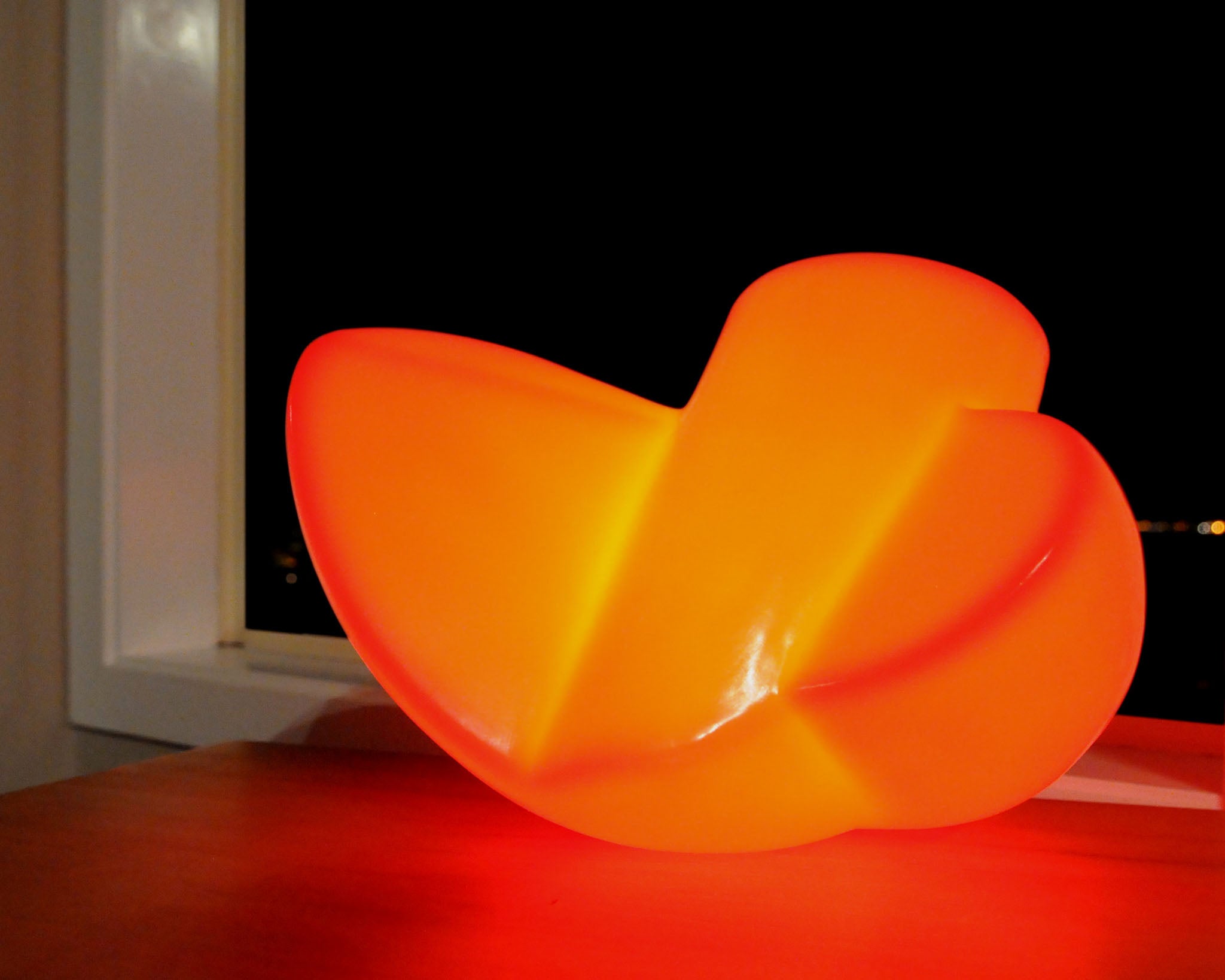 Twist - Red polyethylene table lamp sculpture for sale by Stephen Williams